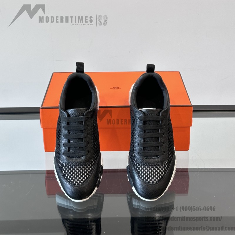 Hermes H251121Z 02360 Black Sneakers – Iconic H Logo on Heel Hermes Mens Sneaker H251121Z 02360 in Black – Front View of Luxury Black Sneakers with Orange H Logo
