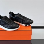 Hermes H251121Z 02360 Black Sneakers – Iconic H Logo on Heel Hermes Mens Sneaker H251121Z 02360 in Black – Front View of Luxury Black Sneakers with Orange H Logo