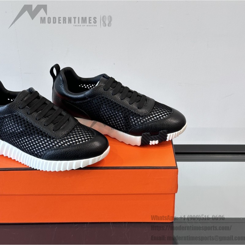 Hermes H251121Z 02360 Black Sneakers – Iconic H Logo on Heel Hermes Mens Sneaker H251121Z 02360 in Black – Front View of Luxury Black Sneakers with Orange H Logo