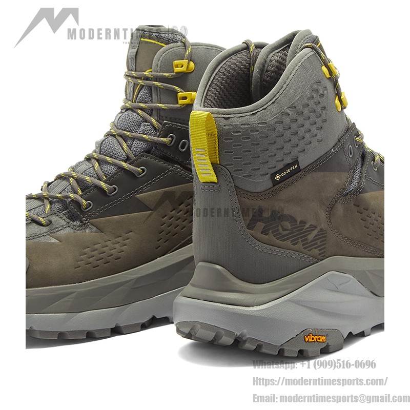 HOKA ONE ONE Kaha GTX Wanderstiefel in Anthrazitgrau/Grüner Glanz mit GORE-TEX-Wasserdichtigkeit und Vibram Megagrip-Sohle, Modell 1112030-CGGS