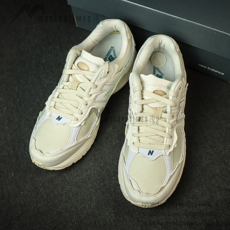 New Balance 2002R Protection Pack Sea Salt M2002RDC – Stylish and Comfortable Sneakers New Balance 2002R Protection Pack Sea Salt M2002RDC Sneaker – Suede and Mesh Design