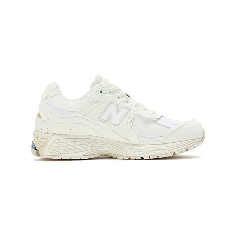 New Balance 2002R Protection Pack Sea Salt M2002RDC – Stylish and Comfortable Sneakers New Balance 2002R Protection Pack Sea Salt M2002RDC Sneaker – Suede and Mesh Design