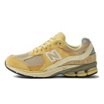 New Balance AURALEE x 2002R Sand M2002RE1 Sneaker – Suede and Mesh Design