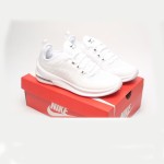 Nike Air Max Axis white with black Swoosh sneakers