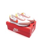 Nike Daybreak CK2351 in white, orange, and tan with yellow highlights