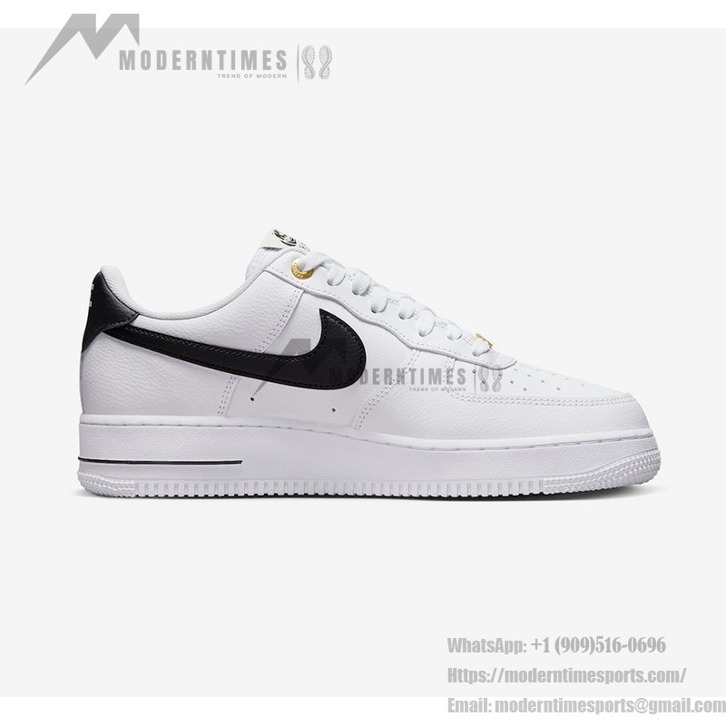 Nike Air Force 1 Low 40th Anniversary - White Sneakers with Black Swoosh and Gold Accents