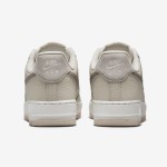 Nike Air Force 1 Low 'Neutral Tone' beige leather sneakers with earthy swoosh for minimalist style