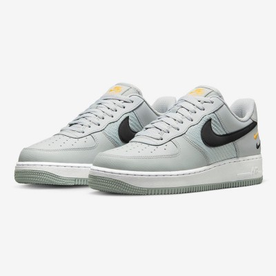 Nike Air Force 1 Low FD0666-002 - Light Gray Leather Sneakers with Triple Swoosh Design for Modern Streetwear Style