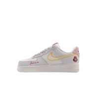 Nike Air Force 1 Low WMNS "Just Do It" DQ7656-100 - Beige Sneakers with Yellow Stitching and Fun Graphic Details for Women