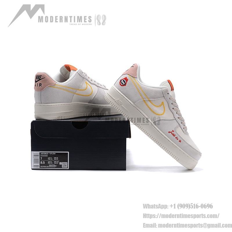 Nike Air Force 1 Low WMNS "Just Do It" sneakers in beige with yellow stitching and graphic details