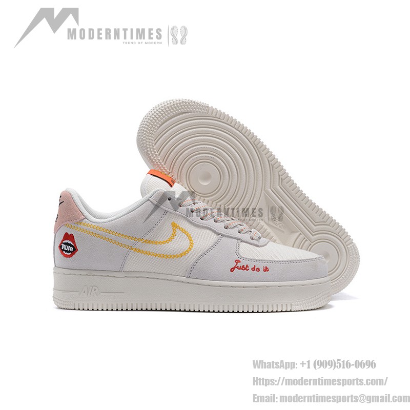 Nike Air Force 1 Low WMNS "Just Do It" sneakers in beige with yellow stitching and graphic details