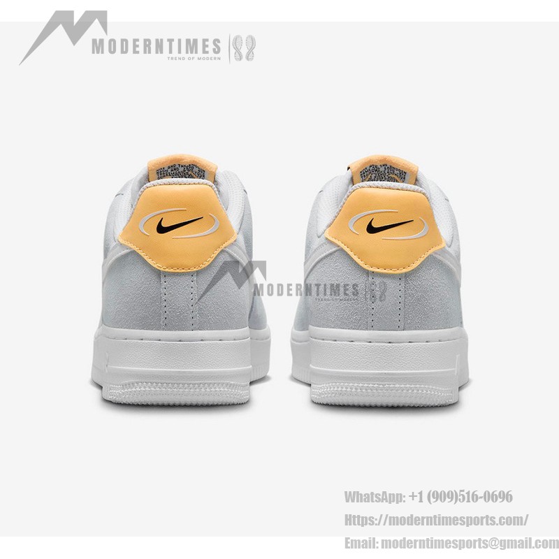 Nike Air Force 1 Low WMNS "Pure Platinum" sneakers in white and gray with yellow accents