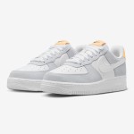 Nike Air Force 1 Low WMNS "Pure Platinum" sneakers in white and gray with yellow accents