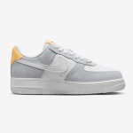 Nike Air Force 1 Low WMNS "Pure Platinum" sneakers in white and gray with yellow accents