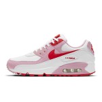 White Nike Air Max 90 Valentine's Day sneakers with pink overlays and red swoosh.