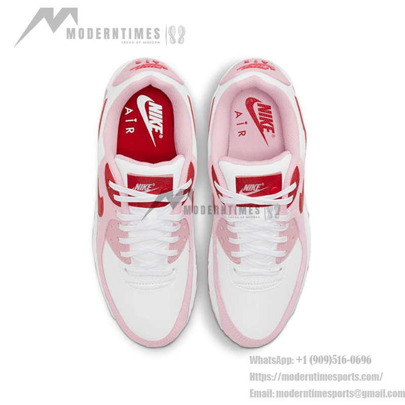 White Nike Air Max 90 Valentine's Day sneakers with pink overlays and red swoosh.