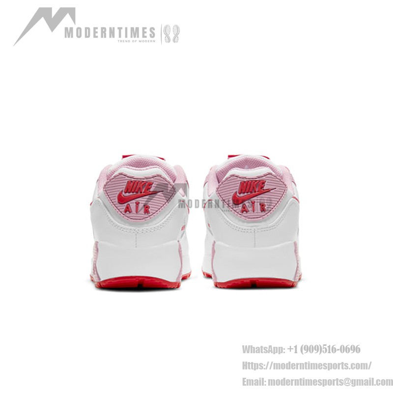 White Nike Air Max 90 Valentine's Day sneakers with pink overlays and red swoosh.