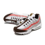 Nike Air Max 95 DQ9016-001 Social FC Tarnmuster Orange-Weiße Sneaker mit Luftkissen