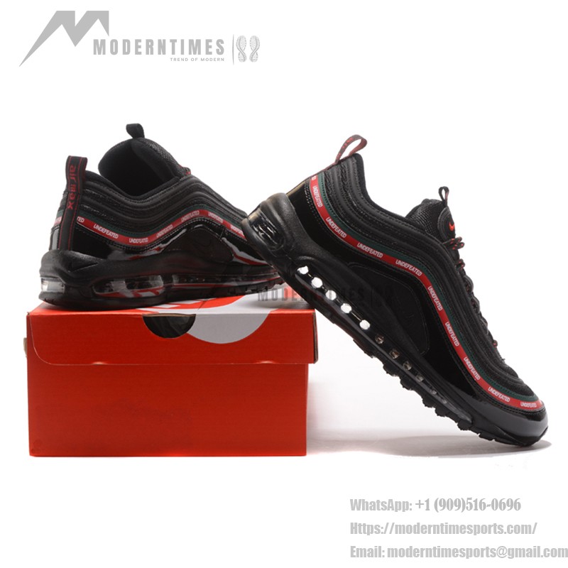 Nike Air Max 97 Undefeated Black/Red AJ1986-001 mit ikonischen roten und grünen Akzenten