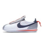 Nike Kendrick Lamar x Cortez Basic Slip House Shoes AV2950-100 - White Slip-On Sneakers with Navy and Orange Details