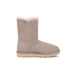 UGG Damen Bailey B2S Oyster 1153612 - Bequeme Schaffell-Mittelstiefel mit stylischem UGG-Riemen