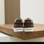 Loro Piana dark brown low-top sneaker with woven textile upper, tonal suede panels, khaki-brown trim and white rubber sole