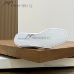 Loro Piana dark brown low-top sneaker with woven textile upper, tonal suede panels, khaki-brown trim and white rubber sole