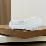 Loro Piana dark brown low-top sneaker with woven textile upper, tonal suede panels, khaki-brown trim and white rubber sole
