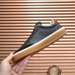 Loro Piana Tennis Walk Sneaker in black textured calfskin and suede with Kummel heel detail and Coffee Gum Sole