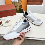 Loro Piana FAM1718-1000 White Leather Sneakers Loro Piana FAM1718-1000 White Sneakers Front View with Red Detailing