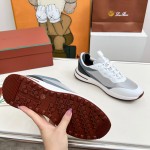 Loro Piana FAM1718-1000 White Leather Sneakers Loro Piana FAM1718-1000 White Sneakers Front View with Red Detailing
