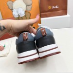 Loro Piana FAM1718-1000 White Leather Sneakers Loro Piana FAM1718-1000 White Sneakers Front View with Red Detailing