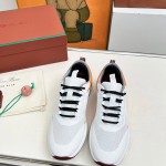 Loro Piana FAM1718-1000 White Leather Sneakers Loro Piana FAM1718-1000 White Sneakers Front View with Red Detailing