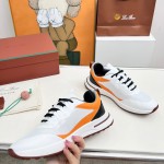 Loro Piana FAM1718-1000 White Leather Sneakers Loro Piana FAM1718-1000 White Sneakers Front View with Red Detailing