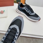 Loro Piana FAM1718-8000 Black Leather Sneakers Loro Piana FAM1718-8000 Black Sneakers Front View with White and Brown Detailing