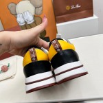 Loro Piana FAM1718-1000 White Leather Sneakers Loro Piana FAM1718-1000 White Sneakers Front View with Red Detailing
