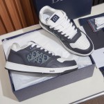 DIOR B27 Uptown Low-Top Sneaker 3SN272AFY H58E in calfskin and a blue Dior Oblique denim panel, single side view
